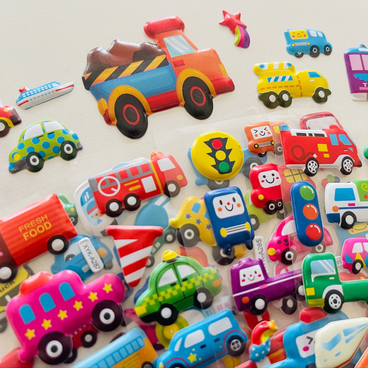 12 3D Cartoon Vehicle Stickers Made of Semi-Gloss Plastic in Irregular Shapes, Designed for One-Time Use. These Educational And Entertaining Reward Stickers Feature Fire Trucks And Excavators, Suitable for Various Surfaces.