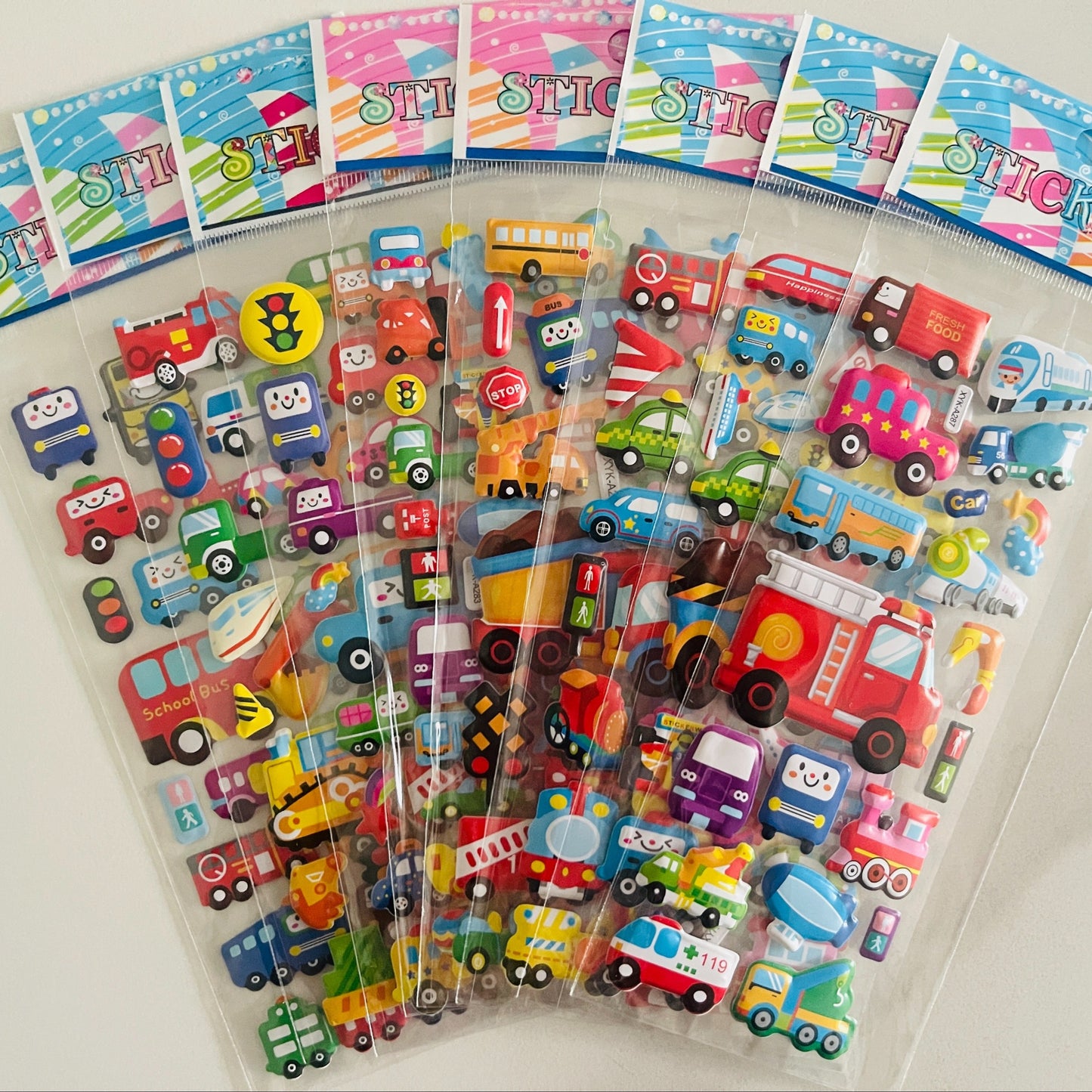 12 3D Cartoon Vehicle Stickers Made of Semi-Gloss Plastic in Irregular Shapes, Designed for One-Time Use. These Educational And Entertaining Reward Stickers Feature Fire Trucks And Excavators, Suitable for Various Surfaces.