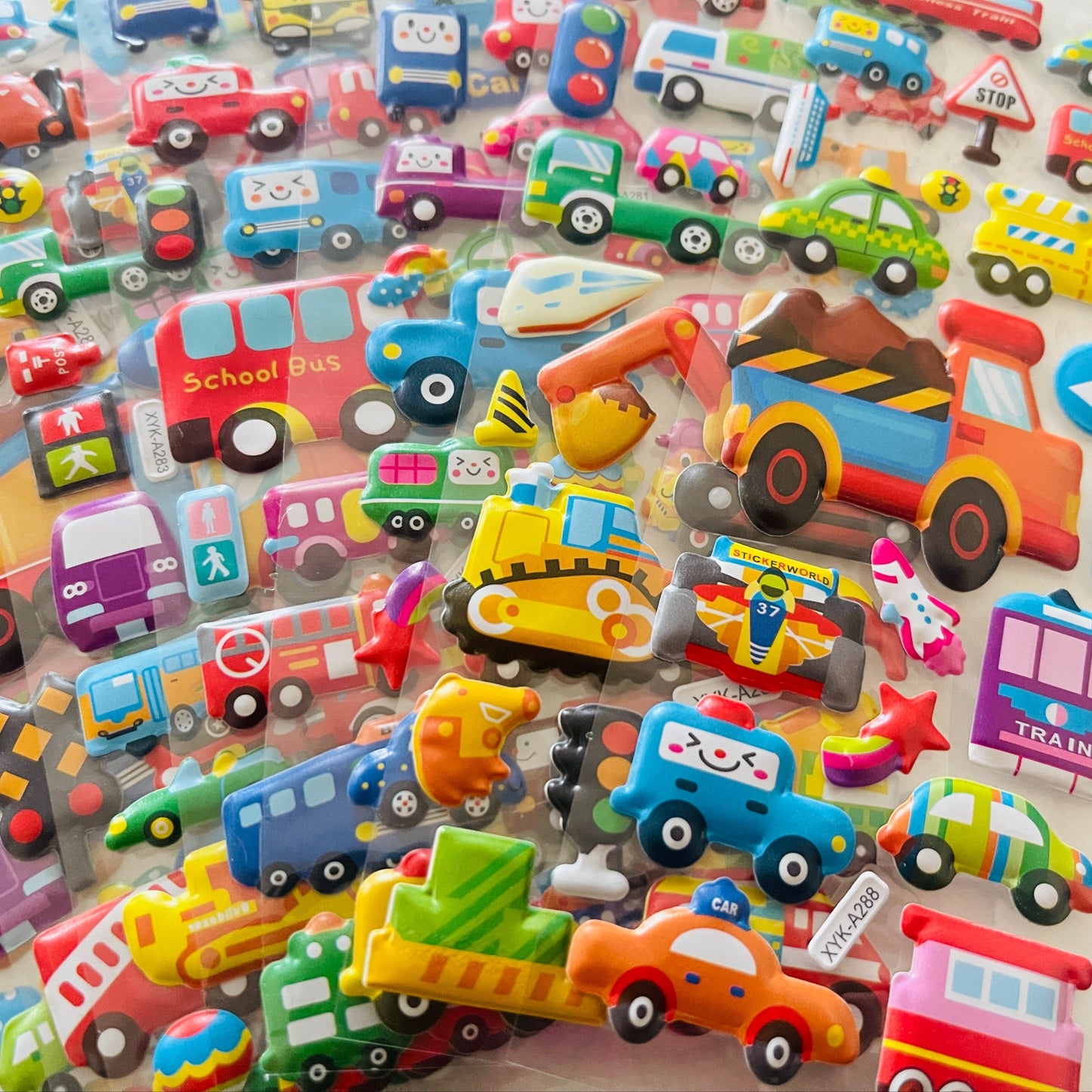 12 3D Cartoon Vehicle Stickers Made of Semi-Gloss Plastic in Irregular Shapes, Designed for One-Time Use. These Educational And Entertaining Reward Stickers Feature Fire Trucks And Excavators, Suitable for Various Surfaces.