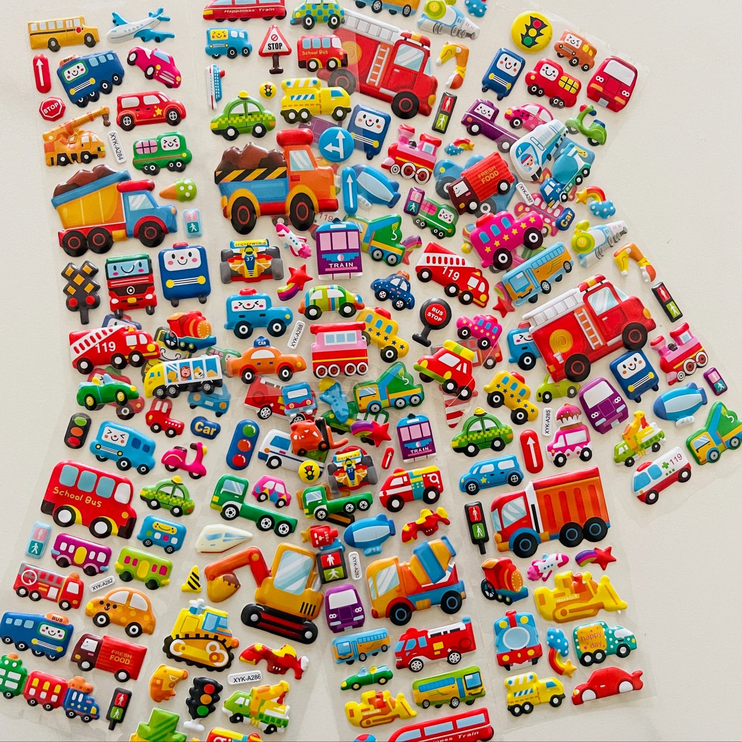12 3D Cartoon Vehicle Stickers Made of Semi-Gloss Plastic in Irregular Shapes, Designed for One-Time Use. These Educational And Entertaining Reward Stickers Feature Fire Trucks And Excavators, Suitable for Various Surfaces.