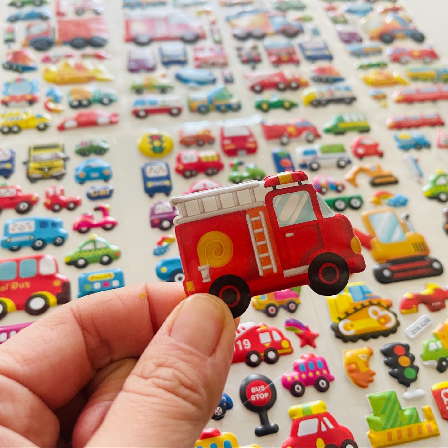 12 3D Cartoon Vehicle Stickers Made of Semi-Gloss Plastic in Irregular Shapes, Designed for One-Time Use. These Educational And Entertaining Reward Stickers Feature Fire Trucks And Excavators, Suitable for Various Surfaces.